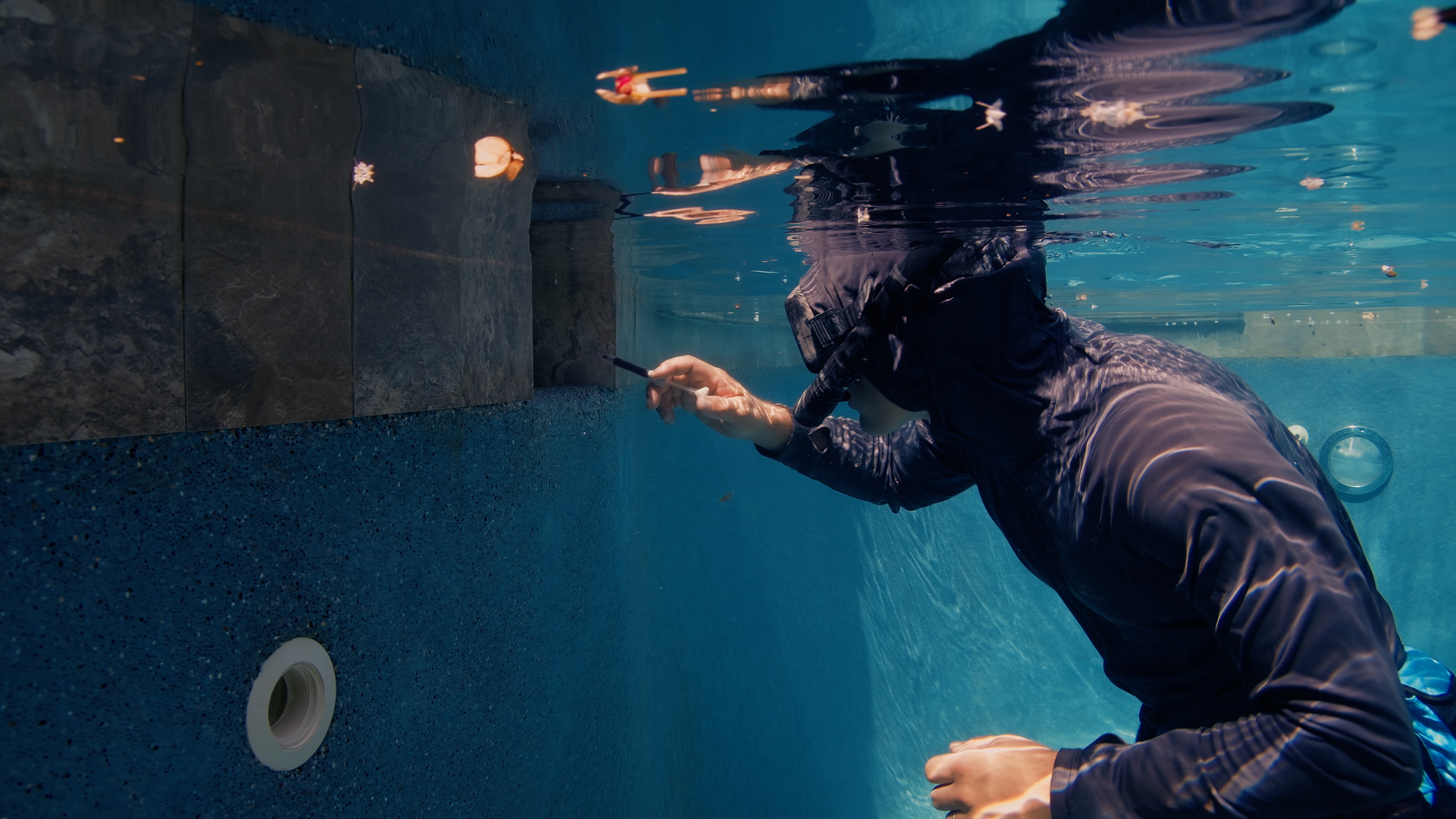 Underwater diver performing leak inspection