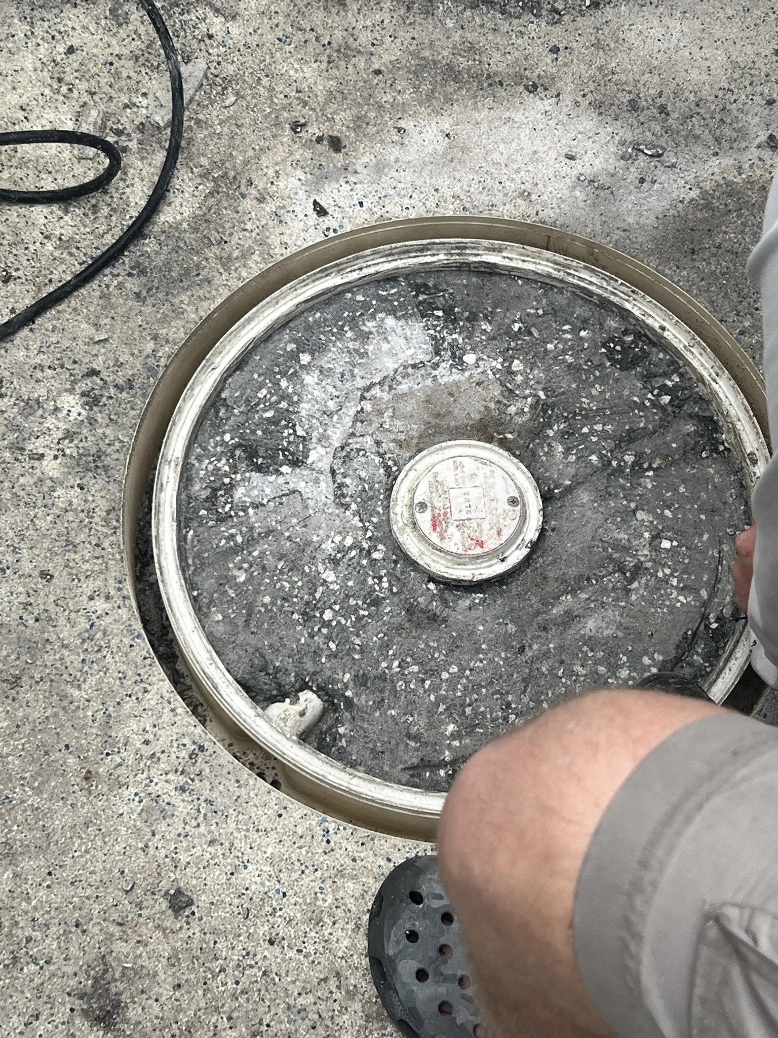 Spa drained to expose the main drain for repair — Ormond Beach, FL