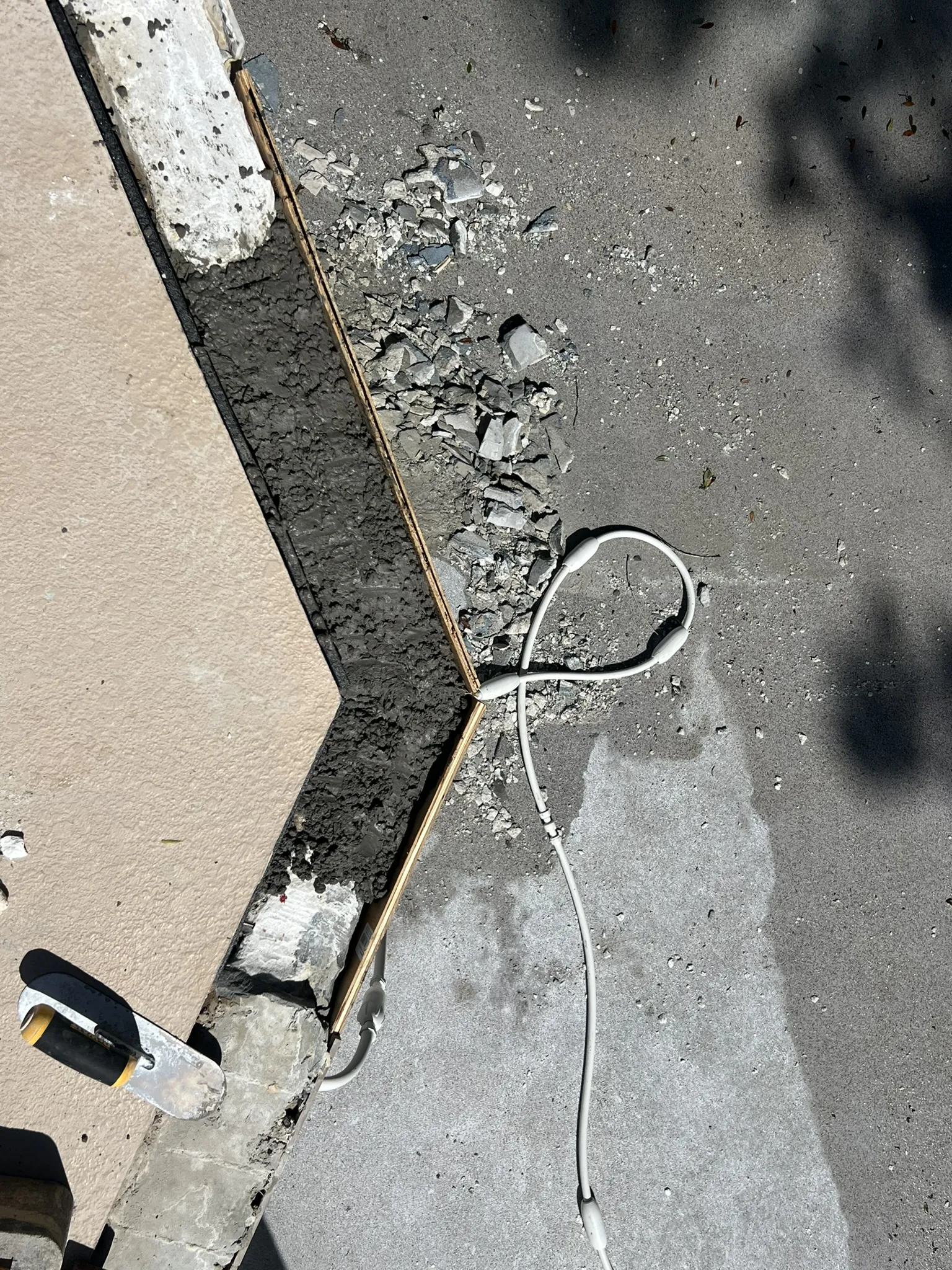High-strength concrete poured to rebuild the pool bond beam — Longwood, FL