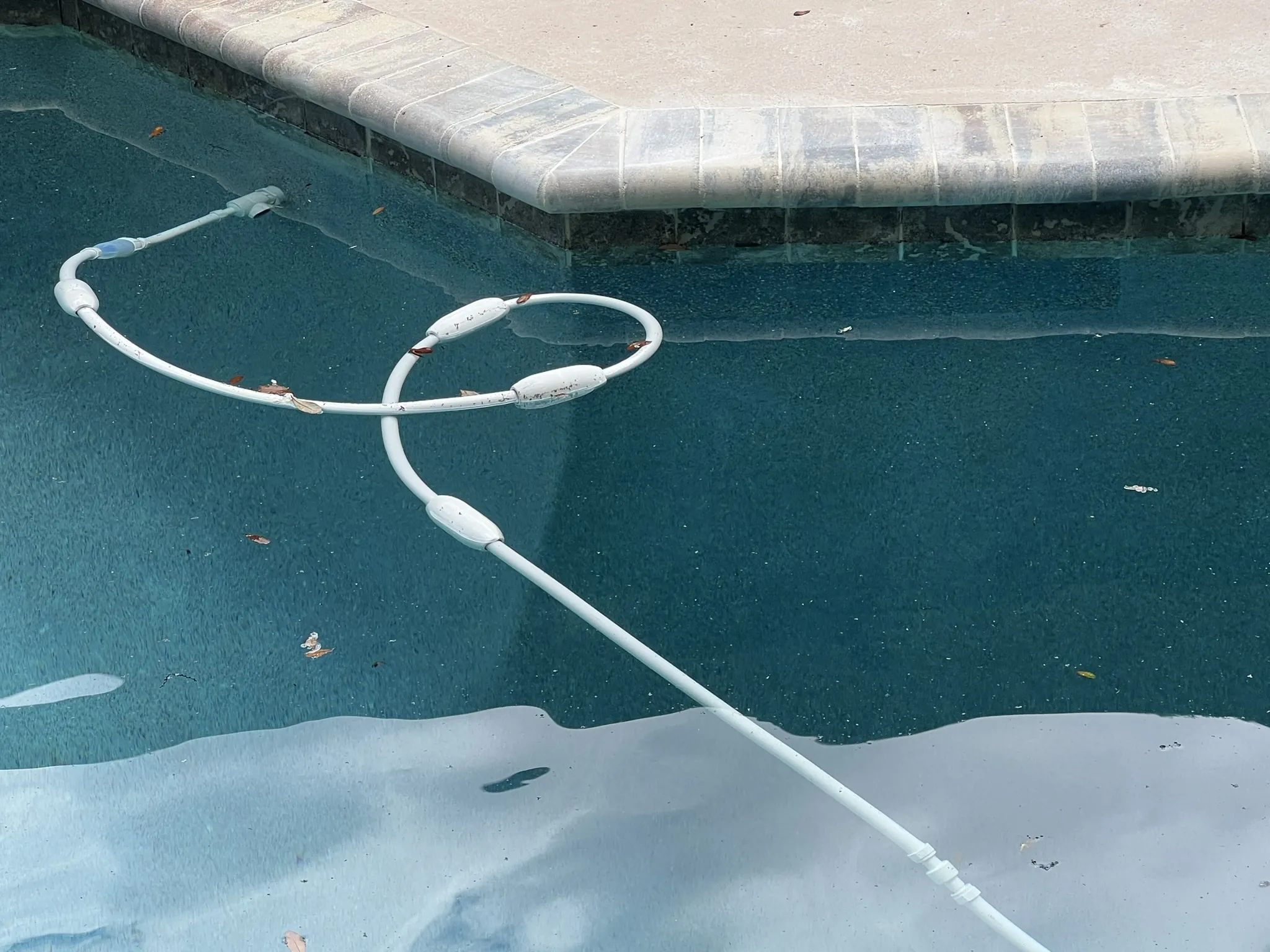 Finished bond beam crack repair with plaster and tile restored — Longwood, FL