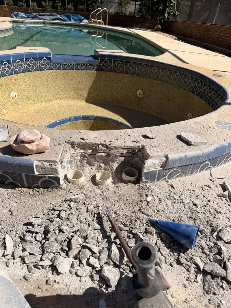 Raised spa beam cut open to reach a broken therapy-jet air line — Ormond Beach, FL